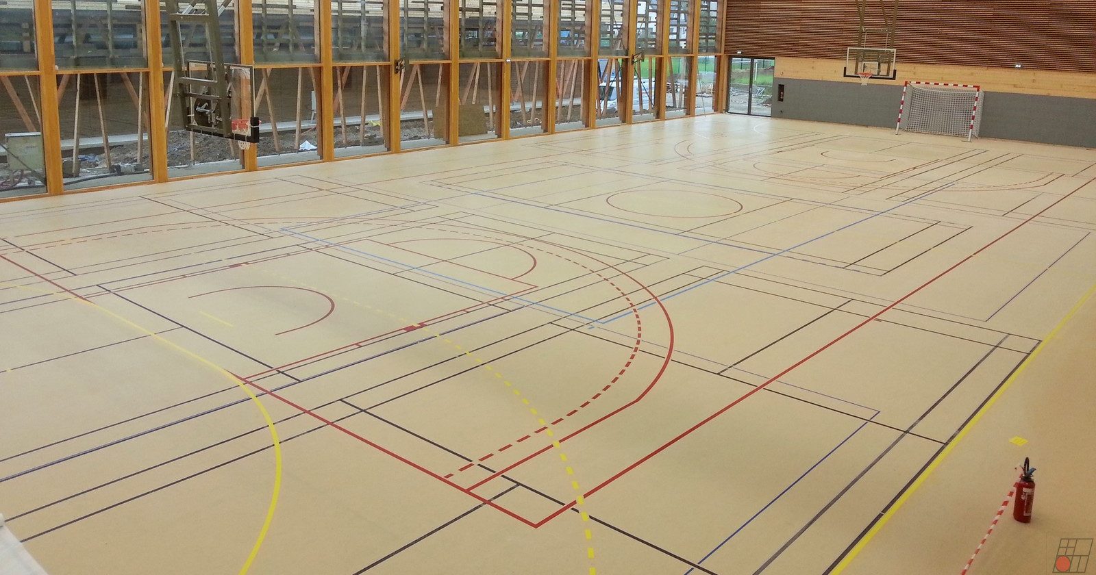 Multisols - Pose d’un sol sportif Tarkett Lumaflex Duo